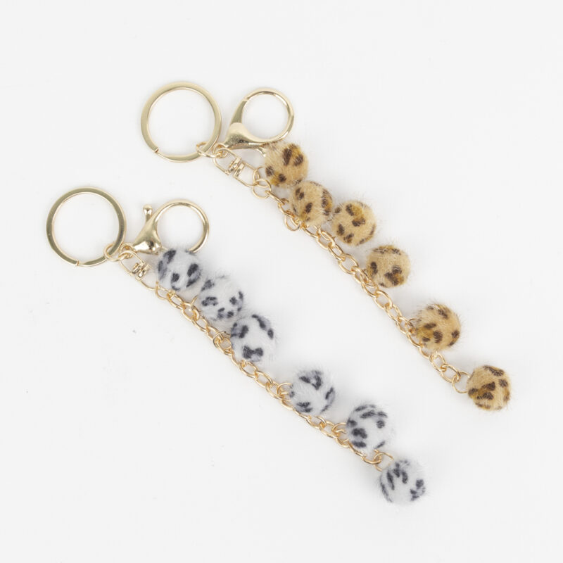 LLAVEROS CHARMS POMPONES